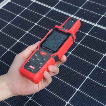 UNI-T UT381PV held over a solar module